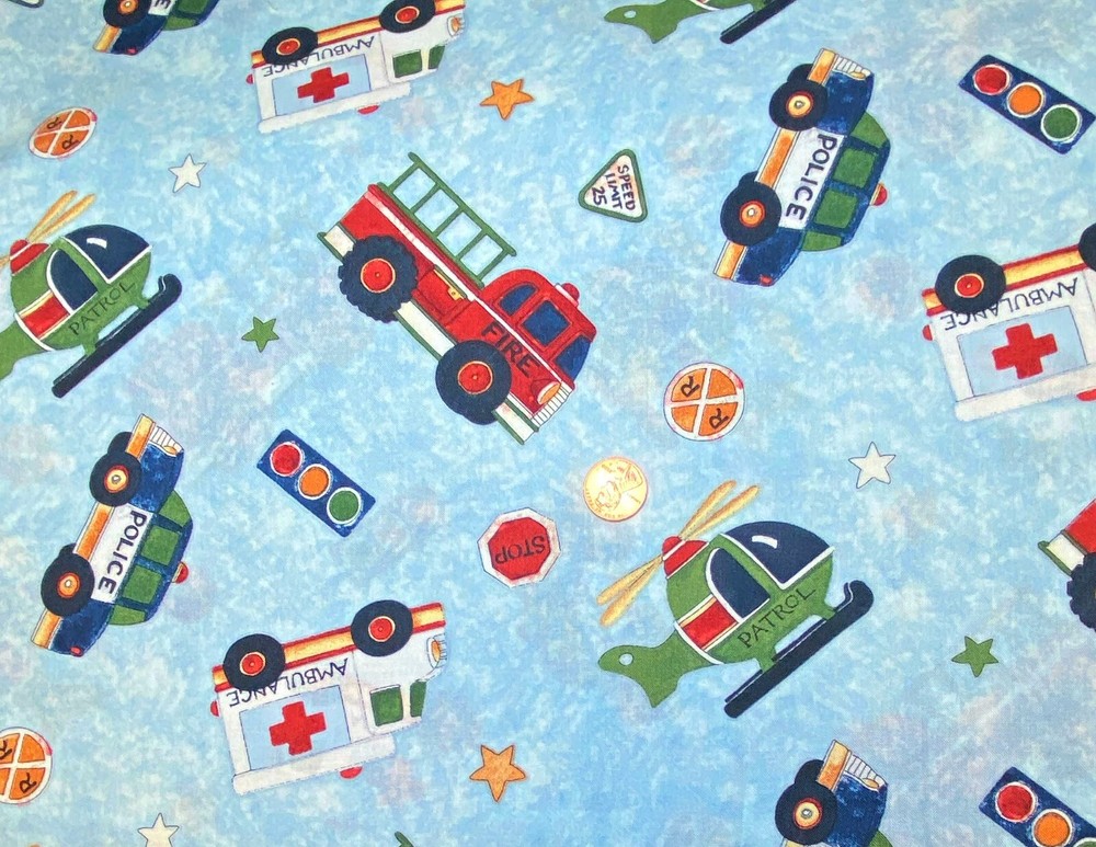 Serve & Protect Emergency Vehicles on Blue Nursery Fabric by Susan Winget, BTHY