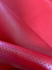 Perforated Vinyl Faux Leather upholstery Red commercial grade upholstery FOLDED