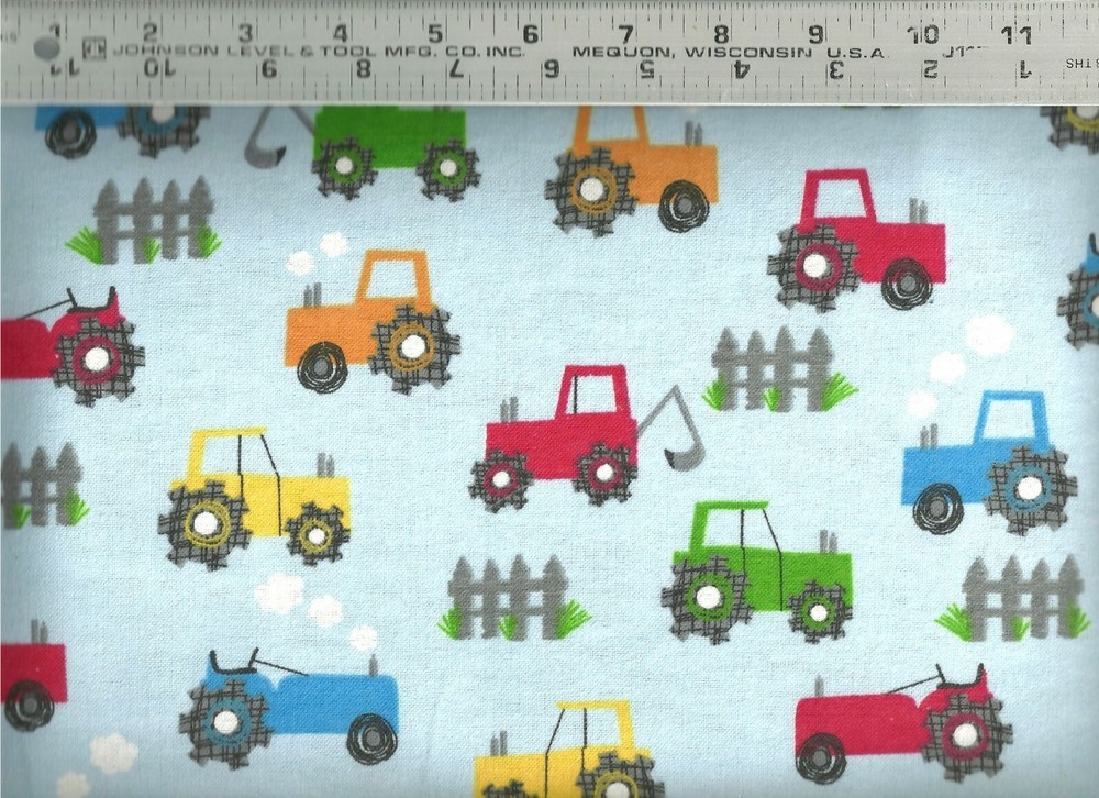 AE Nathan ~ Assorted Red Green Tractors on Blue ~ 100% Cotton Flannel Fabric BTY