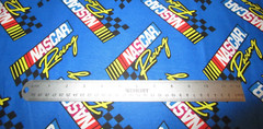 NASCAR RACING FABRIC ON BLUE- BY THE YARD – #2