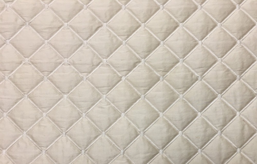 100% silk dupioni padded and quilted in diamond design by Scalamandre 8015