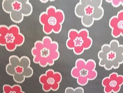 PREMIER PRINTS IKAT PETALS FLAMINGO PINK FLORAL JUVENILE FABRIC BY THE YARD 54″W