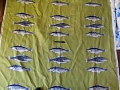 Bryant stacked fish marine green fishing print fabric material buy by the yd CA