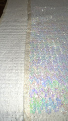EUC iridescent white sequined fabric on white cotton knit backing, 1.5ydLx34″W