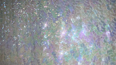 EUC iridescent white sequined fabric on white cotton knit backing, 1.5ydLx34″W