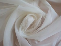 TRANSLUCENT FABRIC OFF WHITE APPROX 117 INCHES WIDE 8 YARDS OR 7.3 METERS DIRTY