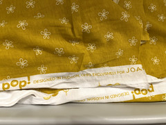 JoAnn- POP! Yellow Flower Outline Jersey Knit Fabric- 2 yards
