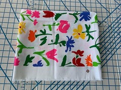 NEW: 1-1/2 yards x 18″ wide (less cut-outs) of a “BRIGHT FLORAL” heavy cotton