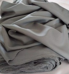 Grey Tropical 100% Polyester non-stretch, machine washable.