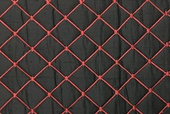 100% silk dupioni padded and quilted in diamond design by Scalamandre 8015