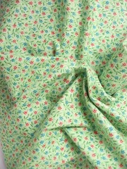 Apple Green Fabric with tiny Red & Blue Flowers Quilting Treasures – BTY – 44″
