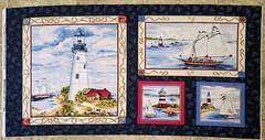 Sail Away Lighthouse & Sailboat 23″ Fabric Panel Exclusively Quilters