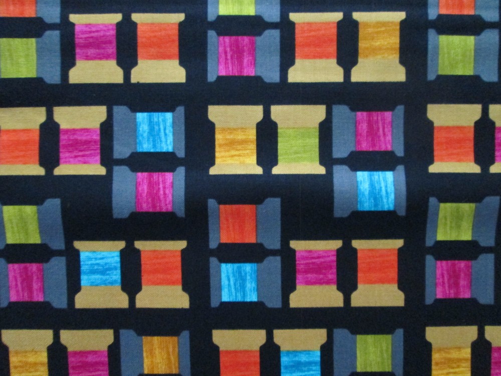 THREAD SPOOLS OF THREAD BRIGHT COLORS BLACK COTTON FABRIC BTHY