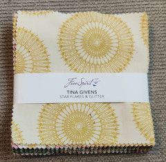 FreeSpirit Star Flakes & Glitter 5″ Charm Squares Cotton Quilting Fabric Pack