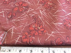 BROWN & ORANGE FLORAL ON RUST POLY KNIT BY MILLIKEN-62 INCH WIDE- 2 YARDS