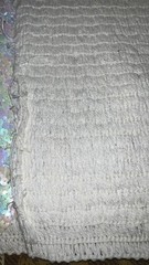 EUC iridescent white sequined fabric on white cotton knit backing, 1.5ydLx34″W
