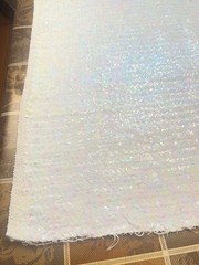 EUC iridescent white sequined fabric on white cotton knit backing, 1.5ydLx34″W