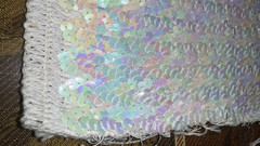 EUC iridescent white sequined fabric on white cotton knit backing, 1.5ydLx34″W