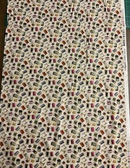 THREAD SPOOLS NEEDLES BOBBINS ON CREAM COTTON FABRIC BTHY