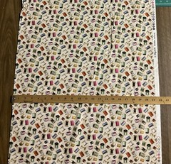 THREAD SPOOLS NEEDLES BOBBINS ON CREAM COTTON FABRIC BTHY
