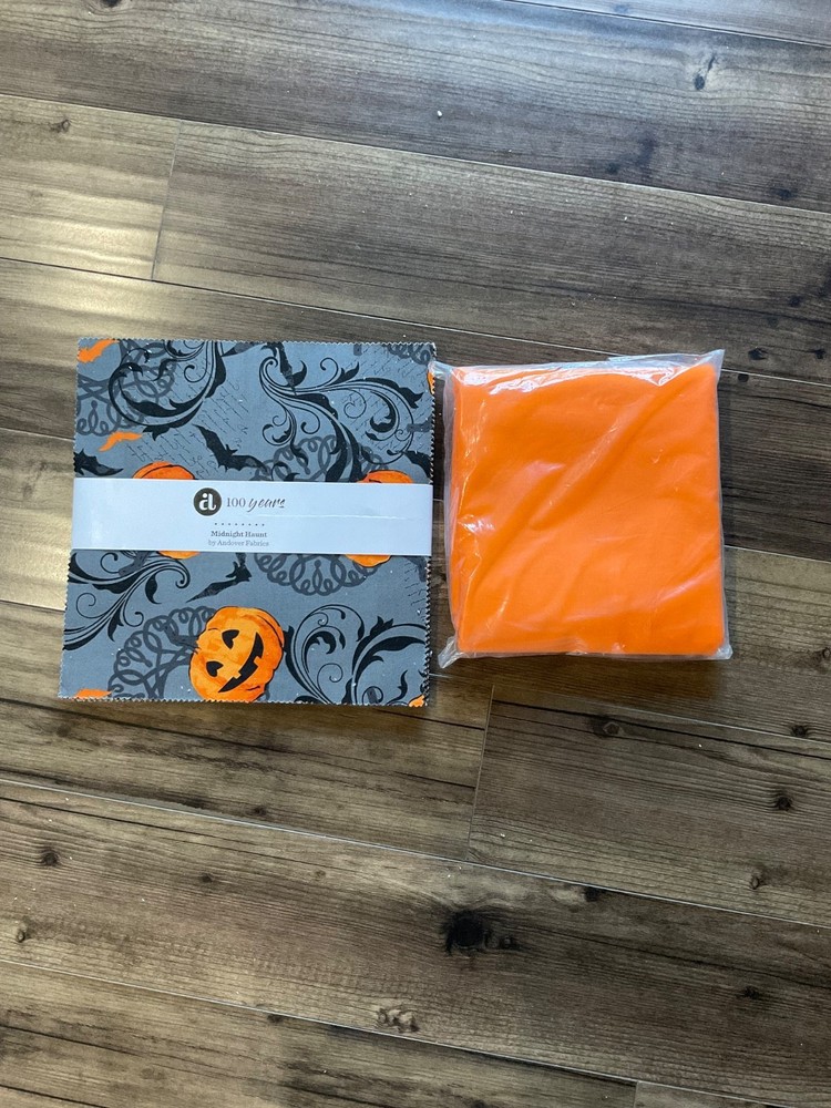 Midnight Haunt Layer Cake, + 2.5 yds orange (clementine) Kona Cotton fabric