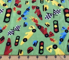 Race Car on Green Flannel fabric sold by the yard #2488